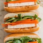 Asian Silken Tofu Banh Mi: ginger-steamed silken tofu served in a baguette with pickled carrots, cucumber, and chili sauce.