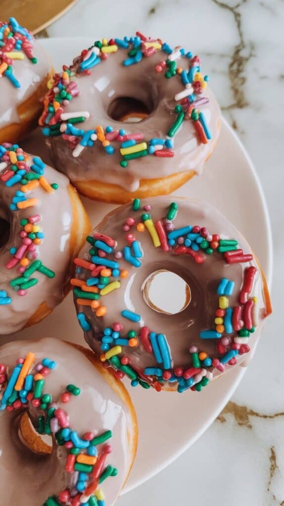 Baked Vegan Donuts with Almond Milk Glaze & Sprinkles